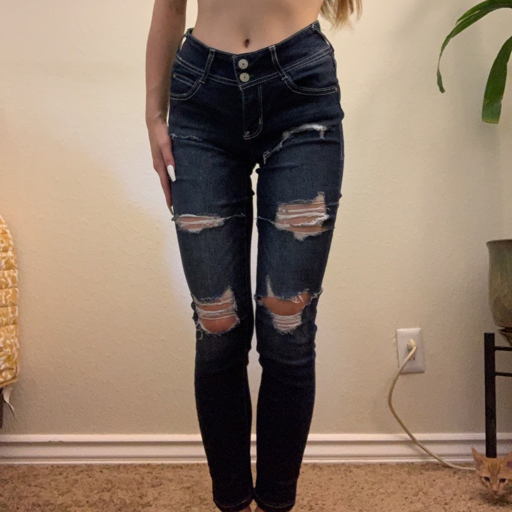 RIPPED LOW-RISE JEANS